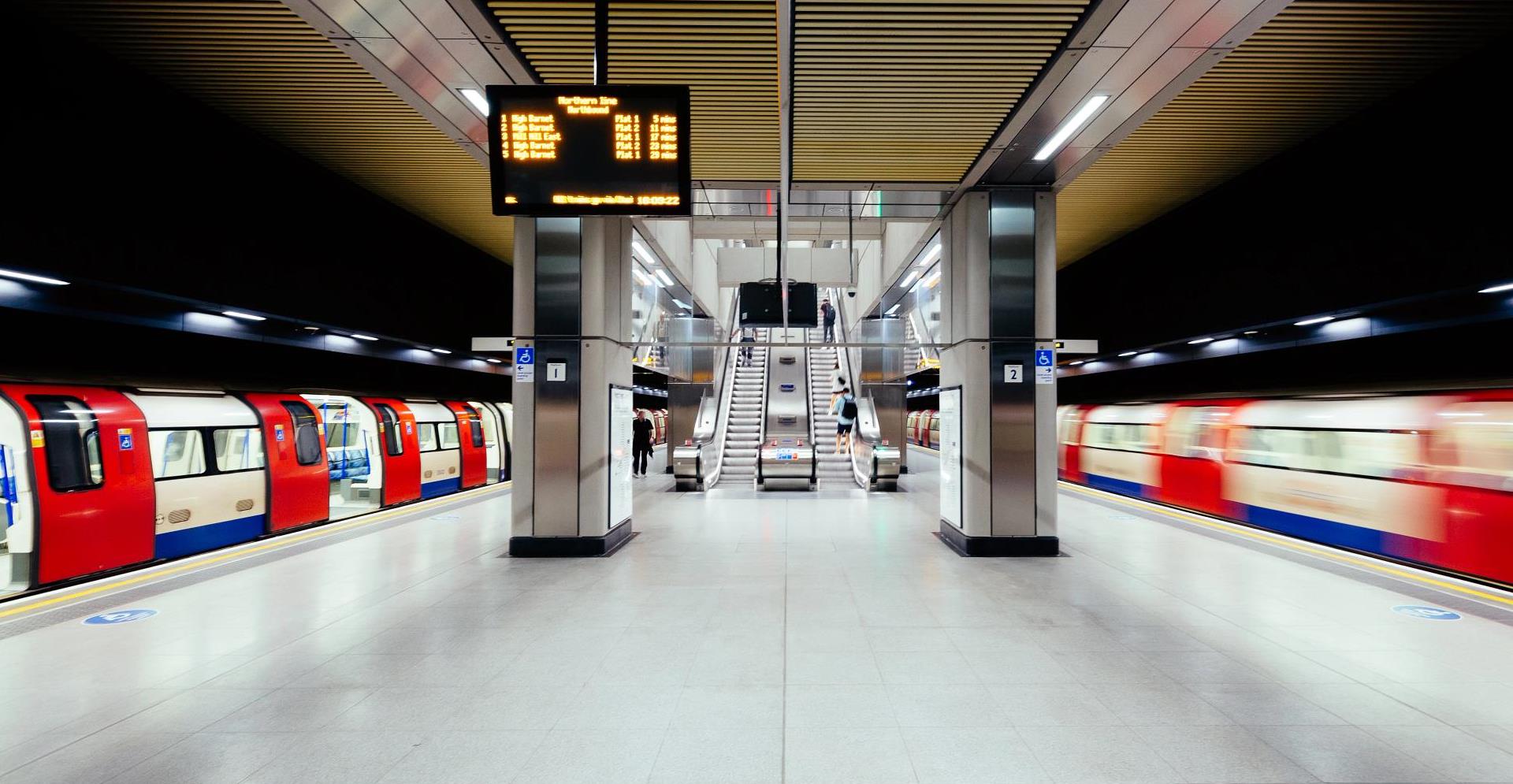Tube trains at modern Battersea Power Station underground station, London, UK