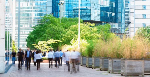 Business People Walking in Financial District, La Defense, Paris, France