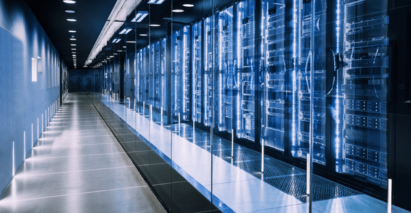 Rows of servers in a data center hallway.