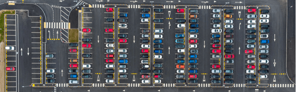 Parking lot filled with numerous cars