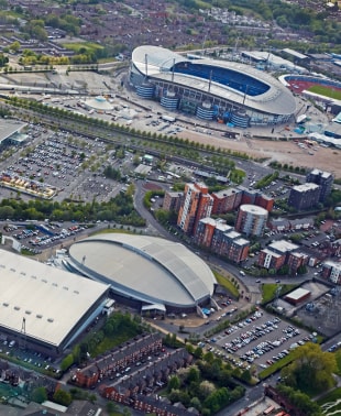 Aerial view showcasing the stadium and its surrounding area, highlighting the layout and nearby structures.