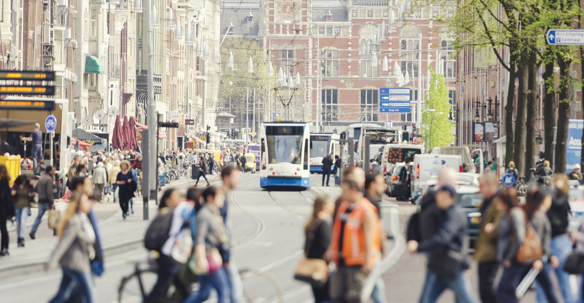 Amsterdam downtown - Amstel river, old houses and a bridge. Nice view of the famous city of Amsterdam. Travel to Europe.