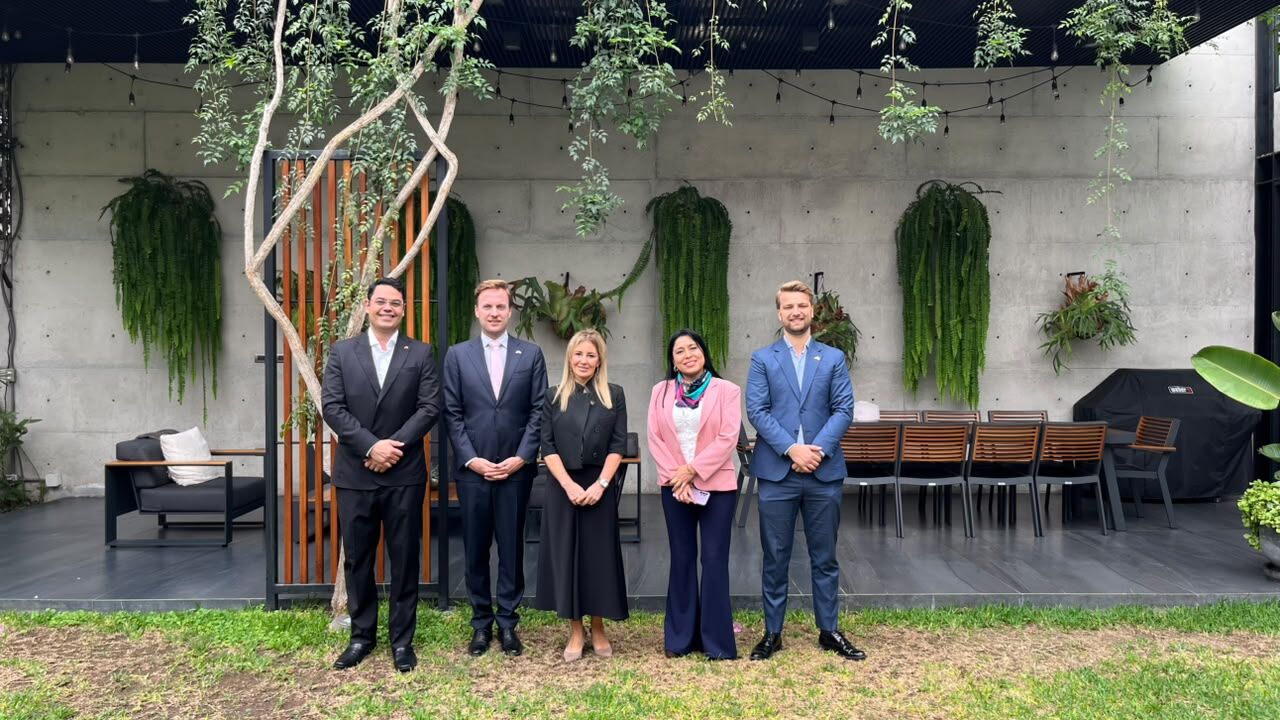 Sustainable mining partnership team photo outdoors.