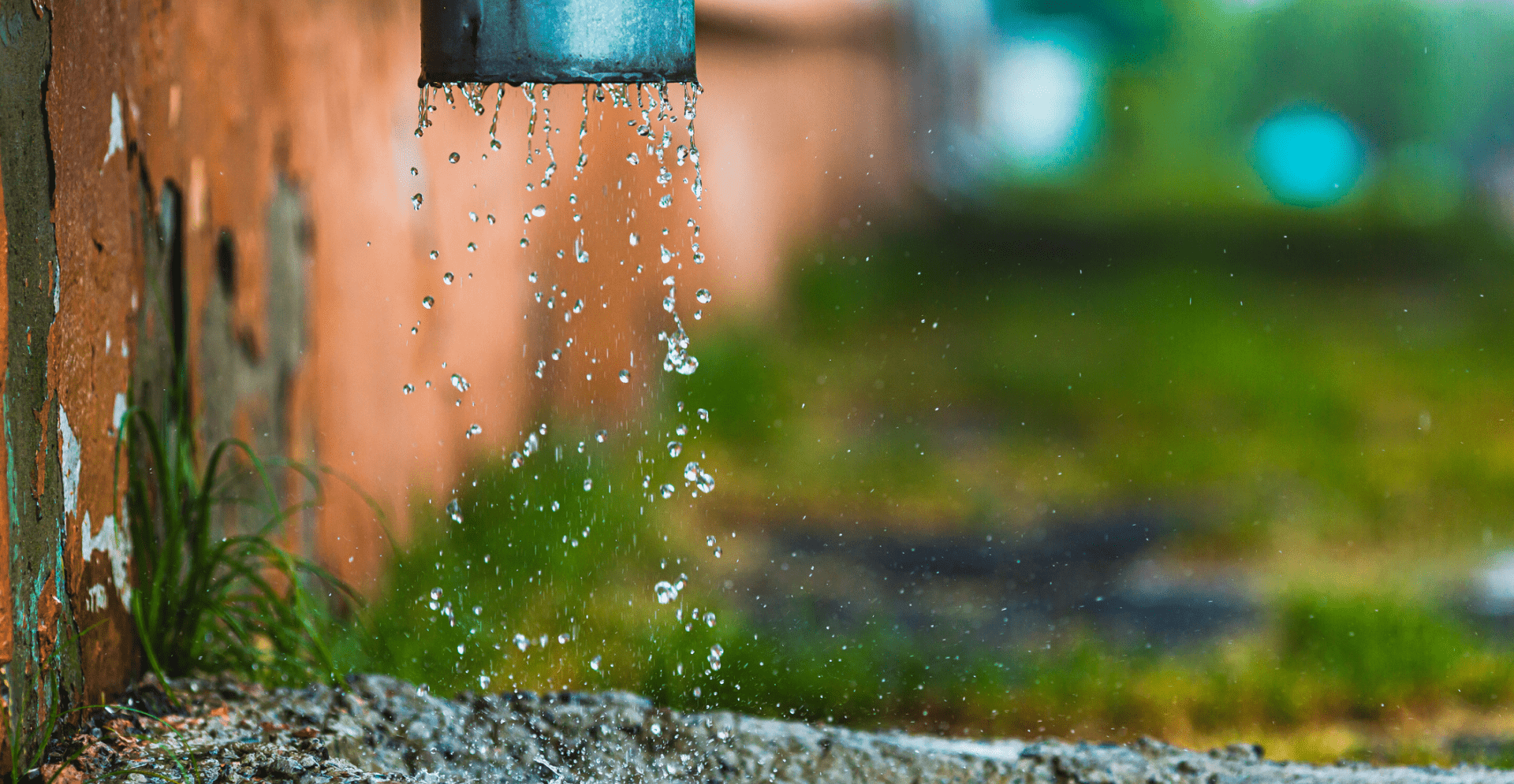 Waste rainwater. Water pipe. Flood. Torrential rain. Rainy weather. Water drops. Raindrops. Drainage