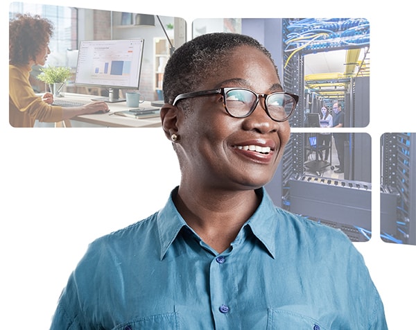 A cheerful woman with glasses dressed in a blue shirt showcases a bright smile, reflecting her joyful personality.