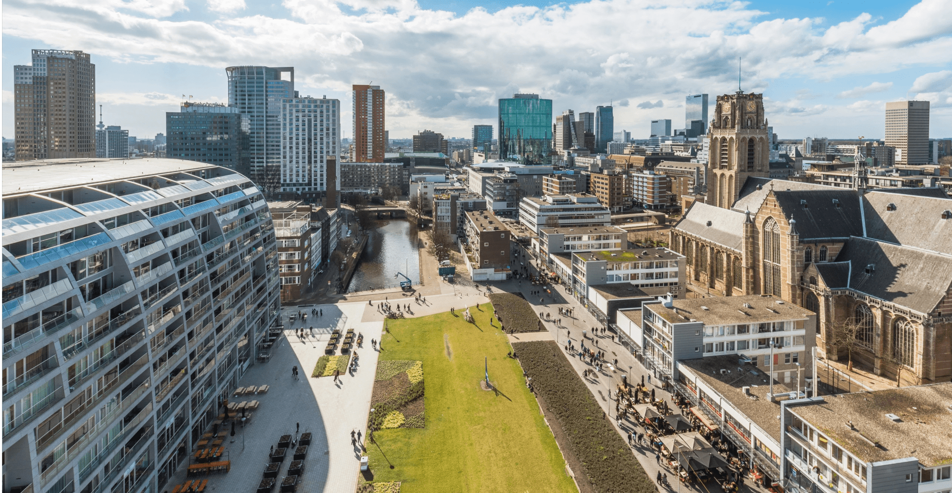 Aerial view of Amsterdam, capital of the Netherlands, showcasing its iconic canals and historic architecture.