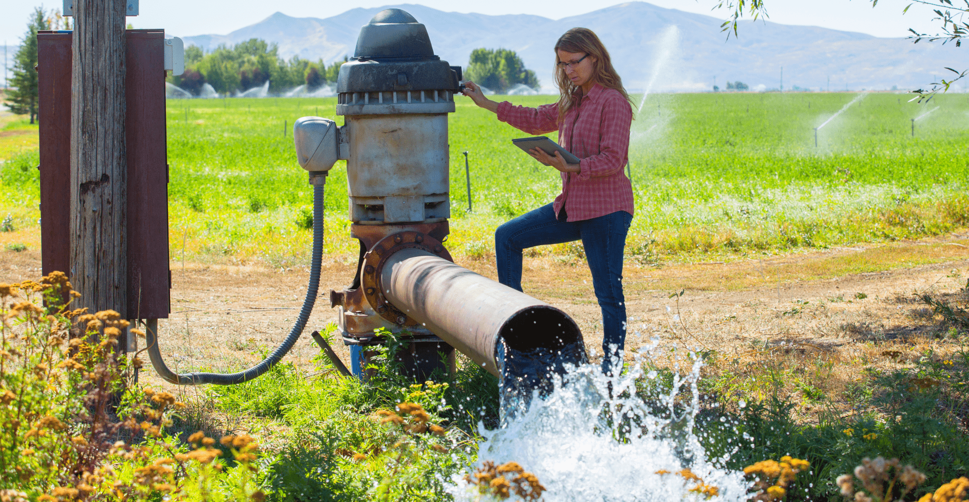 Farmer checking water pump